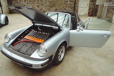 A Tesla battery pack mutes this classic Porsche 911’s flat-six engine