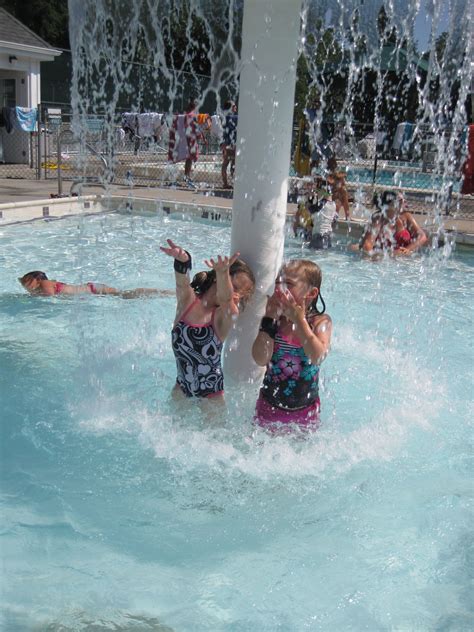 Summer Camp Westchester - Junior Campers cooling off under the water fountain! http://www ...