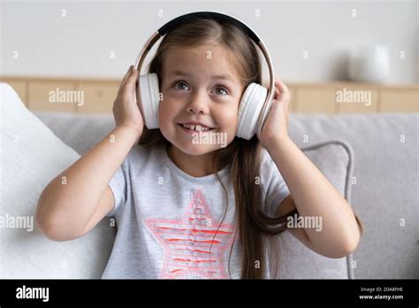 Child searching couch hi-res stock photography and images - Alamy