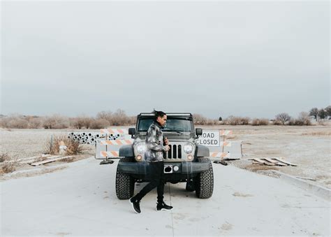 Black and White Jeep Wrangler on White Sand · Free Stock Photo