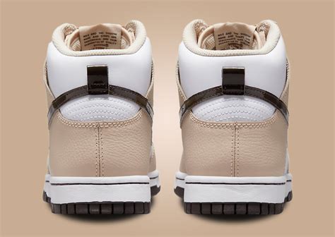 Nike's Dunk High Steps Out In A White And Beige Outfit - Sneaker News