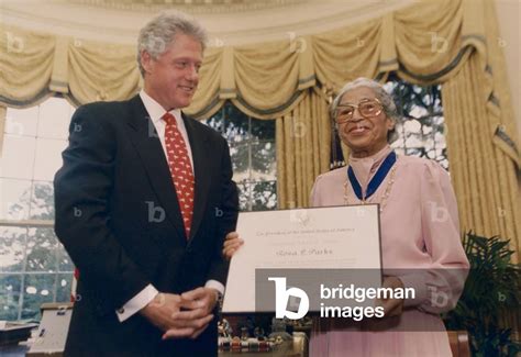 Rosa Parks receives the Presidential Medal of Freedom from President Bill Clinton, Sept. 14 ...