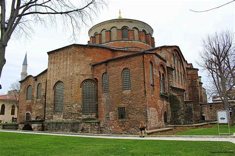 an old brick building with a dome on top