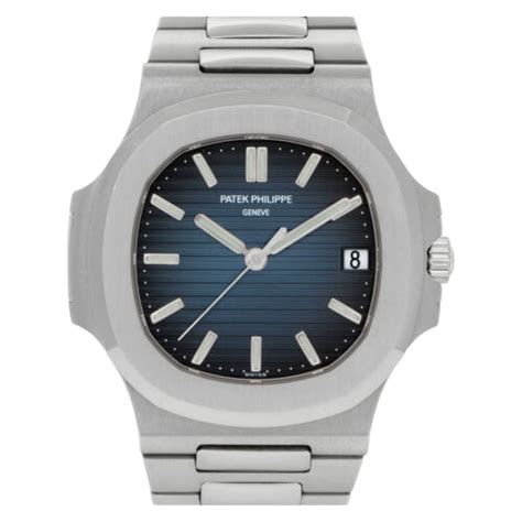 A silver Patek Philippe watch with a blue dial.