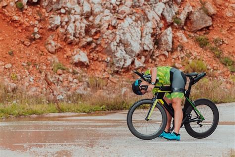 Premium Photo | A professional triathlete preparing for a training ride ...