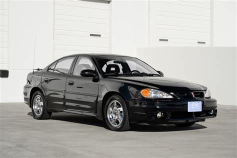 No Reserve: 12k-Mile 2003 Pontiac Grand Am GT Sedan for sale on BaT ...