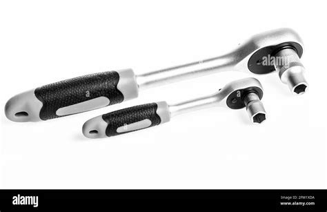 Socket spanner wrenches white background. Knob for socket wrench nut ratchet close up. Ratchet ...