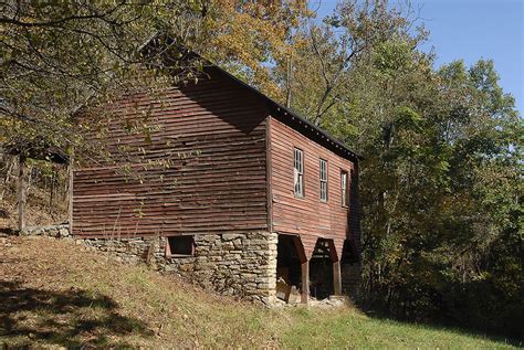 Barn on a slope | Old barns, Farm barn, Old houses