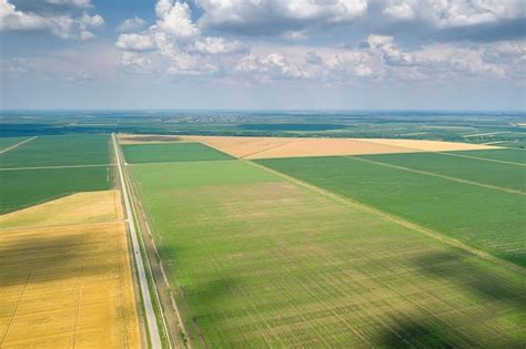 Premium Photo | Aerial view of agricultural fields Countryside Agricultural Landscape Aerial view