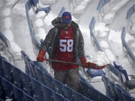 Volunteer shovelers do best to clear Buffalo Bills' Highmark Stadium ...