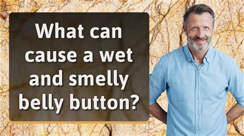 What can cause a wet and smelly belly button? - YouTube