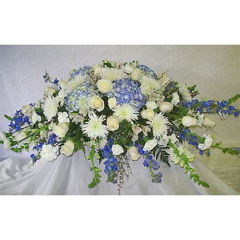 Cascading Blue and White Casket Spray Mebane, NC Florist, Gallery Florist and Gifts, Inc ...