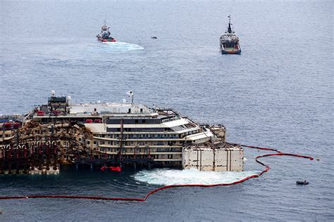 Costa Concordia refloated for final voyage to scrap yard (PHOTOS, VIDEO ...