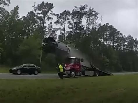 Video: A driver's car soared 120 feet after vaulting off of a tow truck ramp : NPR