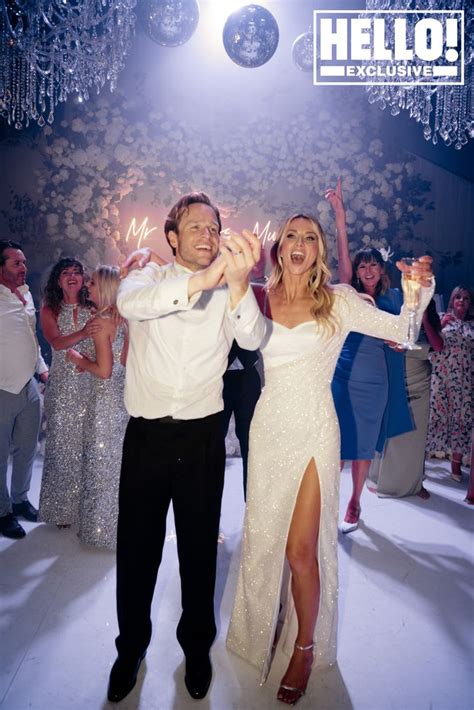 Exclusive: Olly Murs' gorgeous bride Amelia dances in sparkly thigh-split second wedding dress ...