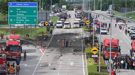 Passenger jet crash onto highway kills 10 in Malaysia