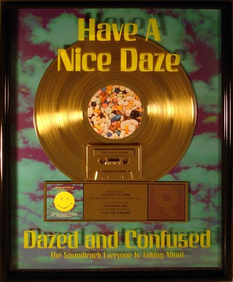 Gold Record award presented to JDK for 500,000 sales of the "Dazed and ...