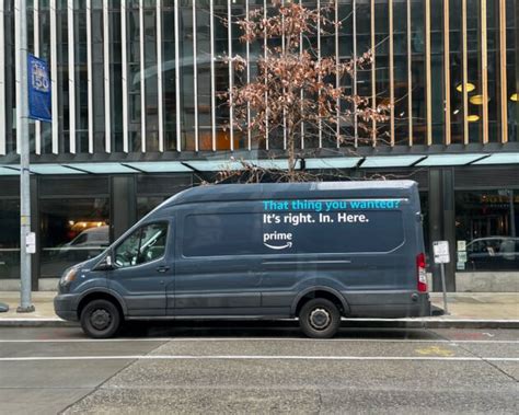 Trying for more smiles? Amazon rolls out quirky mix of new slogans on Prime delivery vans – GeekWire