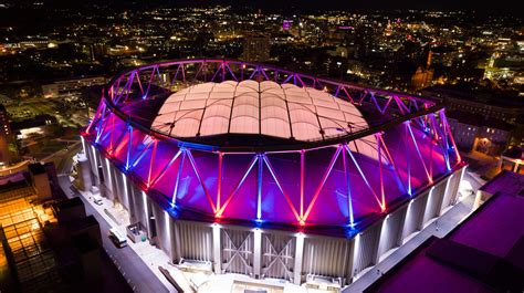 An aerial shot of the Syracuse University Stadium lit up at night. | Syracuse University News