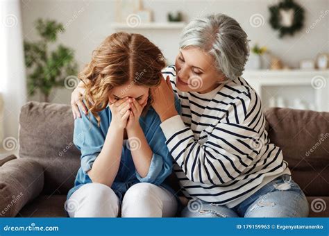 Senior Mother Comforting Crying Daughter Stock Image - Image of ...