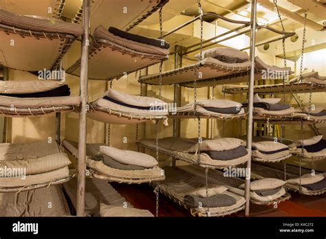 Rows of beds inside WWII Liberty Ship troop transporter Stock Photo - Alamy