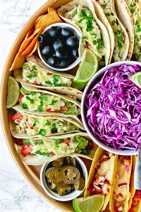 Easy Taco Dinner Party Board (with 2 different taco recipes) - The Yummy Bowl