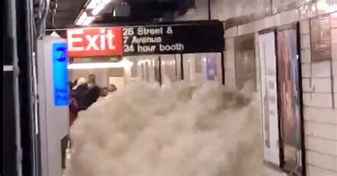 Terrifying New York subway flooding as commuters flee huge waves in ...