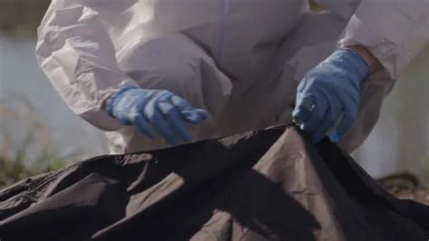 Crime Scene Investigator in Hazmat Suit ... | Stock Video | Pond5