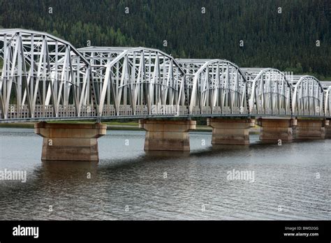 Steel bridge over river on Alaskan Highway Stock Photo - Alamy