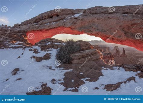 Sunrise at Mesa Arch in Winter Stock Photo - Image of states, rock ...