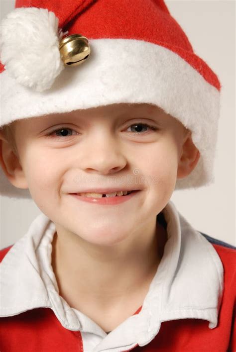 Child with Santa Claus hat stock image. Image of face - 40667069