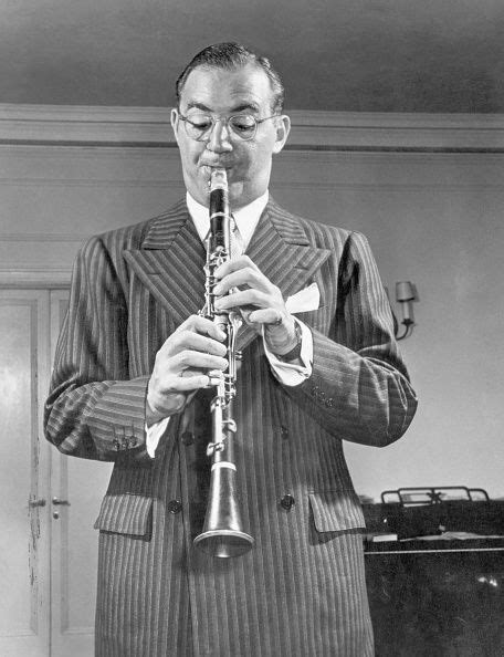 Musician Benny Goodman plays his clarinet. Undated photograph, circa... | Clarinet, Orchestra ...