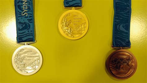 Medalhas Olímpicas de Sydney 2000 - Design, História & Fotos