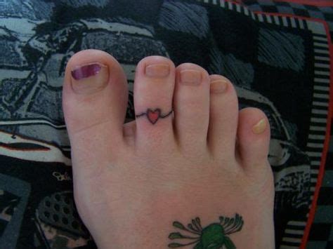 toe tattoos | Toe ring – Tattoo Picture at CheckoutMyInk.com | Toe ring tattoos, Toe tattoos ...