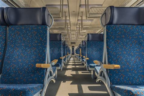 Interior of Blue Train with Blue Seat and Wooden Armrest Stock Image ...