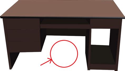 phrase request - What is the term for the open space on desks that chairs fit into? - English ...