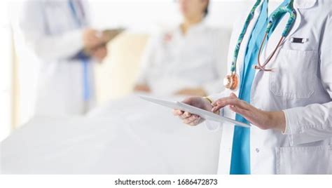 Doctor Nurse Talking Patient Hospital Stock Photo 1686472873 | Shutterstock