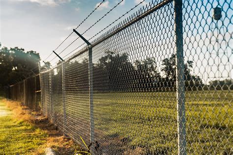 When to Add Barbed Wire to Your Commercial Fencing