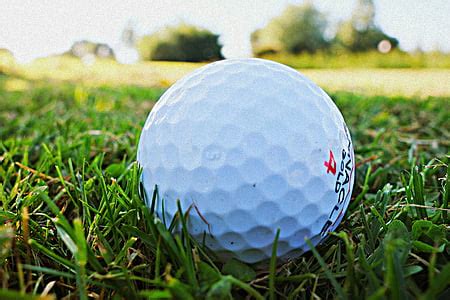 Royalty-Free photo: Selective focus photography of golf ball on golf tee | PickPik