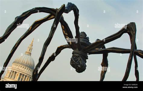 A sculpture by French-born artist Louise Bourgeois of a giant spider, Maman 1999, stands outside ...