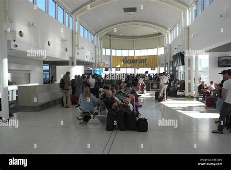 kingsford smith sydney airport terminal 2 with the Tigerair departure gate in the distance ...