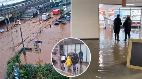 Rain batters Britain with Exeter Airport flooded and cars submerged after warning half a... - LBC