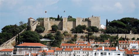 St George's castle towers over Lisbon Portugal. Check out our detailed ...