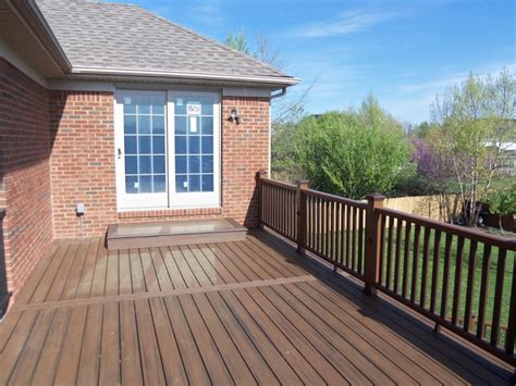 Trex Spiced rum decking | Red brick house, Trex deck, Trex deck designs