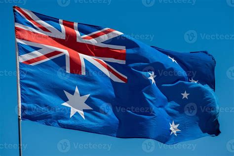 isolated australia flag while waving 12554377 Stock Photo at Vecteezy