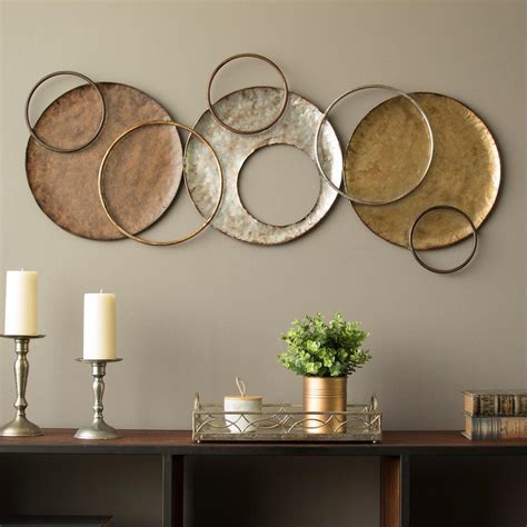 Stratton Home Decor Brushed Gold Over the Door Metal Scroll Wall Decor-S09607 - The Home Depot