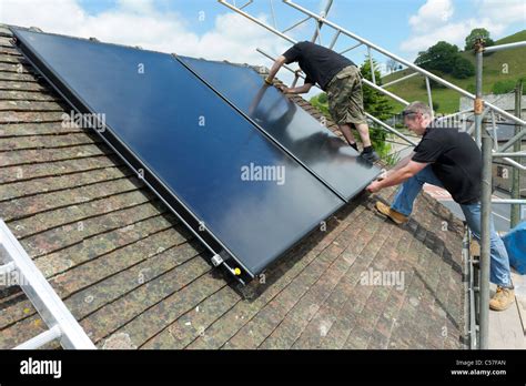 Solar thermal collector panel installation on domestic house Stock ...