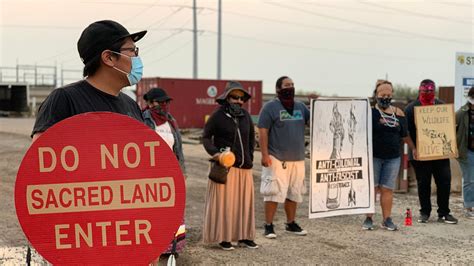 Protesters block border wall assembly site