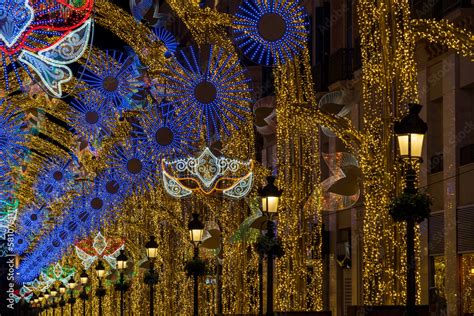 Carnival mask decoration along street in Spain with festive street ...