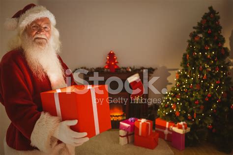 Happy Santa Delivering Presents At Christmas Eve Stock Photo | Royalty ...